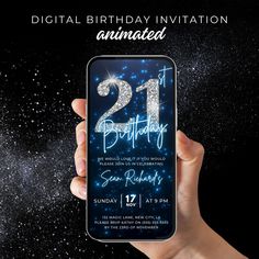 a person holding up a phone with the number 21 on it and sparkling stars in the background