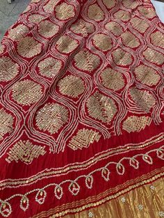 Traditional Silk Sharara With Dori Work, Red Raw Silk Dupatta With Gota Work, Red Silk Saree With Gota Work, Transitional Red Dupatta With Gota Work, Unstitched Silk Suit With Gota Work In Traditional Drape, Silk Unstitched Suit With Gota Work In Traditional Drape, Traditional Red Unstitched Suit With Gota Work, Red Silk Unstitched Suit With Dupatta, Navratri Silk Unstitched Suit With Dupatta