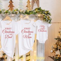 These First Christmas Family Shirts Mom Dad Baby First Christmas Matching Shirts are great option for family Christmas party or as a gift for family that will celebrate Christmas for the first time as a family. Family means everything. Have a very Merry Christmas. We proudly use Bella Canvas super soft tees! Our shirts are 100% made in the USA, high-quality unisex t-shirt that is insanely soft. In fact, it will be one of the softest, best fitting, most comfortable shirts you've ever owned.   - Details - - This is for 1 short sleeved graphic t shirt. - Please see size chart and shirt colors in product images.    T-shirt Features: - 100% Cotton (fiber content may vary for different colors) - Medium fabric (5.3 oz/yd² (180 g/m - Classic fit - Tear away label - Runs true to size   Care instruc Family Matching White Christmas Tops, White Family Matching Christmas T-shirt, Family Matching White Tops For Christmas, White Family Matching T-shirt For Holidays, Family Matching White Holiday Tops, Family Matching White Tops For Holiday, White Family Matching Holiday Tops, White Family Matching Tops For Holidays, Family Matching Cotton T-shirt For Holidays