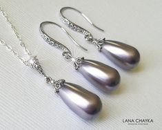 Wedding Swarovski Mauve Light Purple Lilac Teardrop Pearl Earrings Necklace Jewelry Set with .925 Sterling Silver Chain. CHAIN is 18 inches (45.7cm) long. EARRINGS are about 1.33 inch (3.4cm) long from top of earring wire to bottom. PENDANT is about 1.10 inch (2.8cm) long including bail. JEWELRY SET SECTION: https://www.etsy.com/shop/LanaChayka?ref=seller-platform-mcnav&section_id=18873488 BRIDAL JEWELRY SETS SECTION: https://www.etsy.com/shop/LanaChayka?ref=seller-platform-mcnav&section Silver Drop Bridal Necklace Gift, Classic Silver Drop Bridal Necklace, Silver Drop Bridal Necklace As Gift, Silver Pear-shaped Bridal Necklace For Formal Occasions, Formal Silver Bridal Necklace Pear Shaped, Formal Silver Pear-shaped Bridal Necklace, Silver Teardrop Bridal Necklace With Elegant Design, Silver Drop Bridal Necklace For Formal Occasions, Silver Bridal Necklace With Teardrop Elegant Design