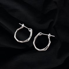 Organic Hoop Silver Earrings from our Sample Lot Jewelry collection.  One of a kind. Insta style fashion jewelry bring out your newest Instagram inspirations and TikTok trends! Whether it's the Y2K, cyberpunk, or classic style renaissance, we are trying them all. * 18k gold vermeil filled with recycled and ethically sourced silver (metal allergy friendly) * earrings fits perfect for everyone * made in our Miami studio, 1-2 weeks production time ------ Sample Lot Jewelry How does sample lot works? At Open Format, we test out new designs with 925 silver, gold vermeil and CZ diamonds before making them with expensive 18k gold and natural diamonds. Sample lot jewelry comes in limited quantities and we may not continue the design later. They are really one of a kind. Since we are testing out th Trendy Metal Hoop Earrings For Streetwear, Minimalist Silver Earrings For Streetwear, Silver Trendy Hoop Earrings For Streetwear, Metal Hoop Earrings For Streetwear, Silver Hoop Jewelry For Streetwear, Handmade Trendy Sterling Silver Hoop Earrings, Trendy Handmade Sterling Silver Hoop Earrings, Y2k Cyberpunk, Hoop Silver Earrings