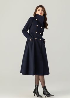 "FEATURES 50% wool, 50% wool blend Fully liner with polyester  With pockets Lapel collar or you can wear it stand up Long sleeve Button closure in front Fitted waist For Winter, Autumn Navy blue wool coat Double breasted wool coat dry clean ★★Mode size Height 170cm (5′ 7″)  Bust 84 cm (33\")  Waist 66 cm (26\")  She wears size XS. ★★Bespoke Order Service If you Request other color Request the length Your height is not between 155 cm- 175 cm Your weight is not between 47 kg -77 kg I can do it for Luxury Navy Wool Peacoat, Luxury Blue Peacoat With Button Closure, Luxury Navy Fitted Peacoat, Luxury Navy Pea Coat With Lapel Collar, Luxury Elegant Peacoat With Double Button Closure, Luxury Navy Long Sleeve Peacoat, Luxury Blue Peacoat With Buttons, Luxury Navy Wool Coat With Button Closure, Coat With Uniform Uk