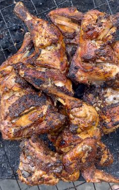 grilled chicken is sitting on the grill and ready to be cooked in the oven