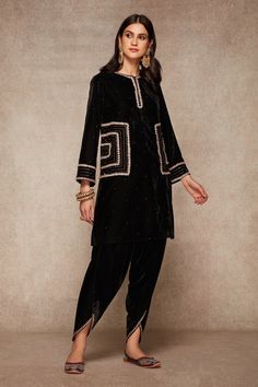 Black kurta with sequins embroidered motifs. Paired with velvet dhoti pant.
Component: 2
Embroidered
Neckine: Round
Sleeve Length: Full
Fabric: Velvet
Color: Black
Sequins work - Aza Fashions Velvet Kurti, Velvet Suit Design, Velvet Kurta, Black Velvet Shorts, Work Dress Code, Black Kurta, Lace Suit, Velvet Dress Designs, Embroidered Motifs