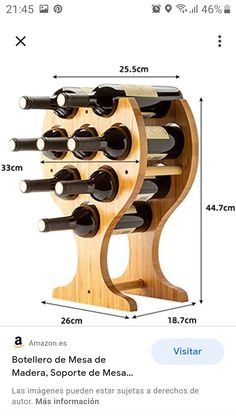 a wooden wine rack with several bottles on it and measurements for each bottle in the same size