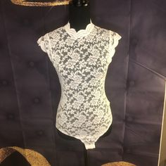 Lace Body Suit With Snap Closure... Comes In Black, White, Mauve And Burgundy... Items Are Brand New Since They Were Delivered In One Single Package There Are No Tags On Each Item. I Also Don't See Where You Can Purchase By Color So Please Indicate Size And Color In A Message I Have 3 Black , 10 Burgundy, 6 White And 6 Mauve Thank You. White Fitted Lace Tops, Fitted White Lace Tops, White Stretch Bodysuit With Lace Trim, White Stretch Feminine Bodysuit, White Feminine Stretch Bodysuit, Spring White Bodysuit With Lace Trim, Spring White Lace Trim Bodysuit, White Lace Bodysuit For Party, Feminine White Bodysuit For Party