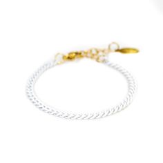 This stunning 18K gold & enamel Santa bracelet is a perfect for Christmas outfits. With its intricate design and exquisite detailing, it's sure to bring a touch of festive cheer to your holiday look. Luxury White Enamel Bracelets, Elegant White Chain Bracelet For Party, Luxury White Jewelry With Gold Chain, Elegant White Gold Enamel Bracelets, Enamel Bracelet Jewelry With Lobster Clasp, Enamel Bracelet With Lobster Clasp, White Enamel Jewelry For Party, Gold Christmas Party Bracelets, Adjustable Gold Enamel Bracelets