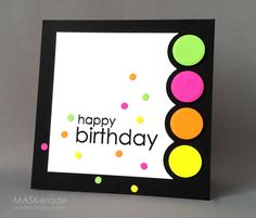 a happy birthday card with colorful dots on the front and black border around the edges