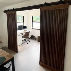 an open door leading to a home office