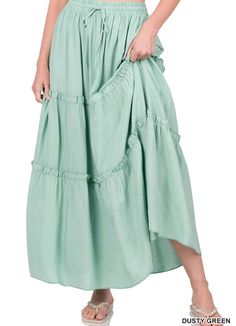 This full-length skirt is designed with an effortless pull-on waistband and a tiered A-line silhouette. This maxi style is made with a soft rayon fabric that's as lightweight as it is lovely, perfect for any day styling. Appx. 37"-38" length. True to Size Functional drawstring Elastic Waistband 100% Rayon WAIST: S- 26" M- 28" L- 30" XL- 32" 1X- 34" 2X- 36" 3X- 38" Ruffle Maxi Skirt, Hebrew Israelite, Fringe Fashion, Dusty Green, Tiered Maxi Skirt, Full Length Skirts, Womens Maxi Skirts, Modest Clothing, Maxi Styles