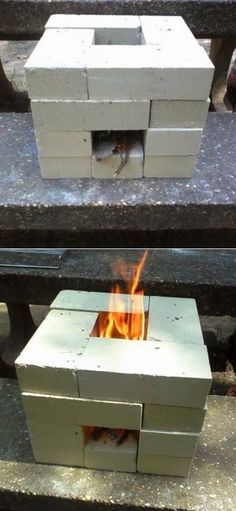 a fire pit sitting on top of a cement bench