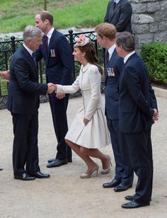 the royal family are greeting each other outside