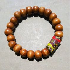 I Let The Sizeable Antique African Trade Bead Do The Talking. The Rest Of The Bracelet Is Honey-Colored, Large Wood Beads. The Stretch Elastic Is Hardy So Wear Without A Care! This Is A Women's M/L And A Men's S/M. Ish. It All Depends On How You Like Your Fit. It's Chunky Yet Can Be Unisex. There Is A Penny Shown For Scale. Let Me Know What's On Your Mind, *Pennyroyal* Motorcycle Chain Bracelet, Bullet Necklace, Hand Necklace, Punk Vintage, African Trade Beads, A Penny, Statement Ring Silver, Mens Leather Bracelet, Square Pendant