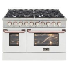 a white stove top oven with four burners and two oven doors on each side