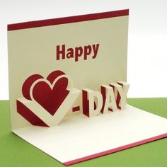 a card with the word happy on it