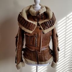 Very Good Condition. One Button Is Missing In The Front. Luxury Brown Outerwear With Buttons, Designer Brown Leather Jacket With Button Closure, Fitted Brown Biker Jacket With Button Closure, Fitted Brown Leather Jacket With Buttons, Luxury Brown Leather Jacket With Buttons, Winter Beige Leather Jacket, Designer Fitted Brown Leather Jacket, Fitted Designer Brown Leather Jacket, Luxury Fitted Brown Biker Jacket