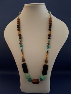 African inspired necklace bead Distinctive handcrafted piece Elegant style Nigerian Necklaces, Nigerian Coral Beads Necklace, Black African Necklace, African Glass Bead Necklace, African Beads Necklace, African Jewelry, African Inspired, Elegant Style, Chain Styles