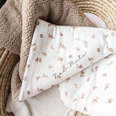 a pile of blankets with the word memee on them next to each other