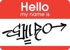 hello name tag with the word hello written in black ink on a red and white background