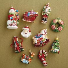 christmas ornaments are laid out on a table