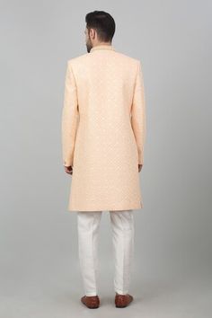 Peach cotton sherwani with all over floral checkered pattern, tonal thread, sequin embroidery and bead work mandarin collar. Paired with kurta and straight fit pant. - Aza Fashions Designer Cotton Fitted Sherwani, Designer Fitted Cotton Sherwani, Designer Cotton Sherwani For Wedding, Elegant Formal Cotton Sherwani, Designer Cotton Sherwani With Chikankari Embroidery, Elegant Cotton Sherwani For Wedding, Designer Cotton Sherwani With Straight Kurta, Designer Cotton Sherwani For Eid, Designer Cotton Traditional Wear For Wedding