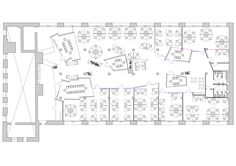 an office floor plan with several tables and chairs