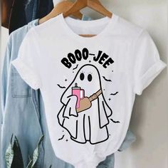 Boo-Jee Halloween Ghost T-Shirt Unisex Unisex T-Shirt Customized This Preshrunk 100% Cotton Tee Brand: Gildan Adult Size Most 100% Cotton Preshrunk Machine Wash Cold With Like *** Let Me Know Your Size Before Purchase ** Available Sizes: Small/ Medium/ Large/ Extralarge/2xl Measurements Are Shown In Pictures! You Can Ask For Other Sizes Or Colors Before Purchase! I Can Customize Special Orders By Request, Remember The Price Depends On The Design You Request. Let Me Know If You Have Any Questions Cricut Halloween Shirts For Women, Novelty White Short Sleeve Top, White Novelty Short Sleeve Top, White Short Sleeve Novelty Top, Novelty White Crew Neck Top, White Novelty Crew Neck Top, White Novelty Tops With Character Print, Winter Cricut Shirts, Spooky White Tops With Screen Print