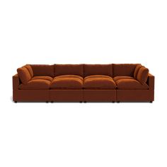 a brown couch sitting on top of a white floor