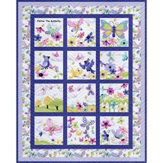 a quilt with butterflies and flowers on it