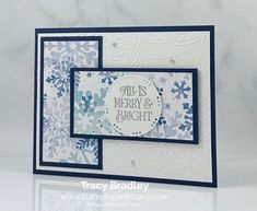 a christmas card with snowflakes and the words merry and bright written on it