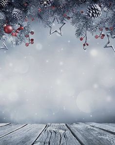 a wooden table topped with christmas decorations