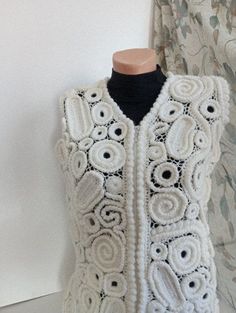 Crochet white women vest, Crochet Lace Vest, Handmade Irish Crochet, art to wear clothing Bohemian cardigan This custom order lace design is Elegant, Bohemian, Party, Romantic, Chic! It features floral pattern, scalloped edge and V-neck. Can be multi-season multifunctional clothing as well. In the presence of white vest size XS custom-made vest is knitted for about 1 month you can knit any color you want knitting time may vary depending on the order The price is for a vest of this size, prices vary depending on your desire for an additional fee, the hood of the sleeve and the length of the vest are knitted I can also crochet, if desired, from wool yarn or cotton yarn For any questions, you can contact White Sleeveless Crochet Top For Fall, White Bohemian Sweater Vest For Spring, White Handmade Crochet Top, Bohemian Fitted White Crochet Top, White Sleeveless Winter Cardigan, Bohemian White Fitted Crochet Top, Casual White Crochet Vest, White Fitted Bohemian Crochet Top, Elegant White Sweater Vest For Winter