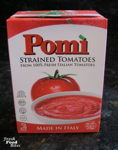 a carton of tomato soup sitting on top of a counter