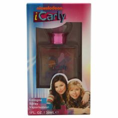 two girls are standing in front of a box with the packaging on it's side