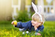 A little boy delights in his Easter dreams as he contemplates a bright Easter egg. Discover similar visuals, whether Easter bunnies, colorful eggs or green meadows, at Colourbox. Eggs Image, Colorful Eggs, About Easter, Easter Bunnies, Easter Egg, Easter Bunny