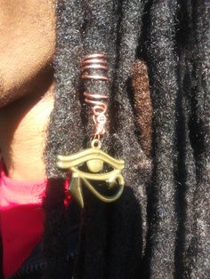 Loc Jewelry/braid jewelry This listing is for 1 - Brass Eye of Horus loc jewelry, dread bead, rasta jewelry. Rasta, Loc, Dreadloc jewelry with a brass eye of horus. Dress up Your Dreadlocs, hair, or braids with Loc Loopies. are handcrafted Beautiful vibrant colorful dreadlock, hair and braid jewelry/accessories that come in a variety of styles. They come in copper and coated colored copper, they come in shiny metallic color and they come in non-shiny metallic color. They come with hanging pendan Handmade Adjustable Bohemian Body Jewelry, Handmade Brass Body Jewelry As A Gift, Handmade Adjustable Spiritual Body Jewelry, Adjustable Spiritual Single Earring, Hair Loc Jewelry, Loc Hair Jewelry Dreadlocks, Loc Jewelry Beads, Dread Jewelry Locs, Dread Beads Loc Jewelry