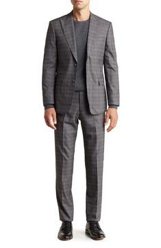 A refined plaid two-button suit cut in a trim silhouette is the perfect go-to for any well-dressed event. 36.4" inseam; 7.8" leg opening; 10.6" rise (size 36) Jacket has peak lapels; chest welt pocket; flap welt pockets
 77% polyester, 21% rayon, 2% spandex Dry clean Imported Model stats: 6'1" height, 32" waist. Model is wearing size 36. Plaid Notch Lapel Suit For Formal Occasions, Formal Plaid Suits With Notch Lapel, Classic Plaid Suit With Hidden Button Closure, Classic Plaid Suits With Hidden Button Closure, Tailored Plaid Suit With Notch Lapel, Elegant Plaid Suits With Hidden Button Closure, Tailored Plaid Suit For Semi-formal Occasions, Semi-formal Plaid Suit With Notch Lapel, Fitted Plaid Timeless Blazer