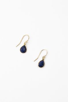 Teardrop shaped lapis bezels are eye-catching. Short in stature, but not short on style, these beautiful gold bezel settings with gold filled ear wires are an AVD favorite for a reason. Gold Filled (Lead & Nickel Free) Lapis .75", with gold filled ear wires We hand select our natural materials, thus there may be slight variations in color and/or size that will not detract from the overall aesthetic. Our unique handcrafted designer jewelry for women is made in America, each design created individ Lapis Lazuli Teardrop Jewelry With Matching Earrings, Teardrop Lapis Lazuli Jewelry With Matching Earrings, Gold Teardrop Lapis Lazuli Earrings, Designer Handmade Jewellery, Handcrafted Necklace, Pearl Gemstone, Smokey Quartz, Simple Earrings, Simple Jewelry