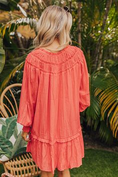 - Live your best beach life with this flowy dress! - Lightweight material with a built-in partial lining - A ruffled v-cut neckline with a tie detail - Gathered ruffles at the yoke - Long, loose sleeves with smocked cuffs - A relaxed silhouette that ends in a mini dress length hemline Loose Sleeves, V Cut, Flowy Dress, V Cuts, The Coast, Beach Life, Live For Yourself, Shift Dress, Dress Length