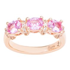 Stunning, timeless and classy. This ring is filled with rich, high quality gemstones, featuring oval-cut pink sapphires, prong-set with alternating smaller round created white sapphires, hand set in rose plated 925 sterling silver. Every single ring is hand made, making it a unique masterpiece. Surprise someone special in your life with this luxurious anniversary ring. Or even better, this could be the perfect birthday gift. Treat someone to a ring that's not only strikingly gorgeous but reminds your special someone that your love will lasts for all eternity. This ring is designed by Suzy Levian with a message. By creating jewelry that is beautiful inside and out, Suzy Levian's message is revealed through a hidden brown fancy diamond (.02 ct) set inside the band of this ring to empower wom Gemstone Brooch, Cubic Zirconia Bracelet, Single Ring, Cubic Zirconia Necklace, Cubic Zirconia Jewelry, Fancy Diamonds, Cubic Zirconia Earrings, Creating Jewelry, Jewelry Rings Diamond