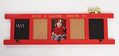 a red wall mounted photo frame with the words hook and ladder rescue on it