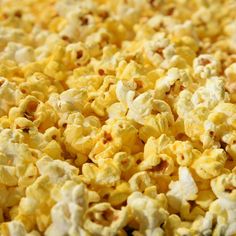 a close up view of popcorn that is yellow