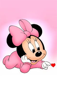 a cartoon minnie mouse laying on the ground with a heart in it's mouth