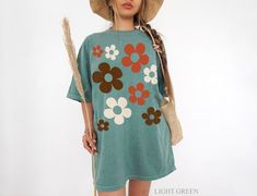 🍄 Retro daisy aesthetic tee by TheCocoBear 🍄 With its groovy colors and oversized flowers, you can embrace your inner flower child whether you're on your coffee run, having a picnic in the park, or lounging by the beach 🍄 Comfort Colors brand, garment-dyed 100% ringspun cotton 🍄To ensure sizing, refer to size chart in photos and compare measurements to those of a shirt you already own that fits well. 🍄 Non-toxic, eco-friendly, water-based inks safer for you & the environment. 🍄 The Comfort Oversized Retro T-shirt For Spring, Oversized Floral Print T-shirt For Spring, Spring Oversized Floral Print T-shirt, Vintage Flower T-shirt For Summer, Oversized Vintage T-shirt For Spring, Daisy Aesthetic, Groovy Colors, Oversized Flowers, Daisy Shirt