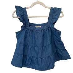 Ruffled Sleeves Tiered Design Cotton & Polyester Blend Blue Denim Features: Tiered Tank Size: Womens Xl Condition: New With Tags Trendy Ruffled Medium Wash Denim Top, Trendy Ruffled Denim Top For Spring, Fitted Medium Wash Denim Top With Ruffles, Trendy Medium Wash Denim Top With Ruffles, Chic Denim Top With Ruffles, Dark Wash Cotton Denim Top With Ruffles, Light Wash Denim Top With Ruffles, Casual Light Wash Top With Ruffles, Trendy Light Wash Ruffled Tops