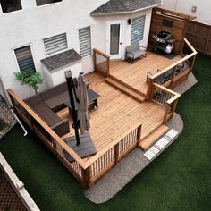 an aerial view of a deck and patio