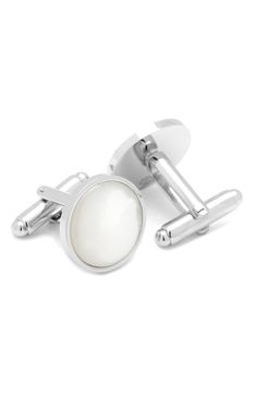 Milky mother-of-pearl illuminates these refined round cuff links cast from high-shine rhodium plate. 3/4" diameter Bullet back Rhodium plate/mother-of-pearl Imported Pearl Cufflinks, Pearl Cuff, Cufflink Set, Stud Set, Silver Cufflinks, The Expert, Cuff Links, Pearl Studs, Ox