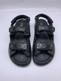 Chanel leather CC 'Dad' Sandals. Unworn & 100% authentic guaranteed. Supplied in its original packaging. DETAILSBlack CC.Black.Leather.Velcro Strap.Made in Italy. Need assistance? Use our Sourcery service or chat to a member of our team via WhatsApp Basket New Balance, House Of Chanel, Dad Sandals, Fashion Chanel, Chanel Official, Chanel Official Website, Fashion Buyer, Global Style, Comfy Shoes