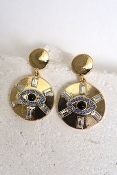 Evil Eye Pendant Earrings.Keep the bad vibes away with this evil eye rhinestone earring featuring high polish plating and post backing. Length: 1.5" Metal Dangle Earrings With Evil Eye, Evil Eye Metal Jewelry For Parties, Metal Evil Eye Jewelry For Parties, Love Earrings, Evil Eye Earrings, Eye Earrings, Eye Pendant, Evil Eye Pendant, Drop Earring