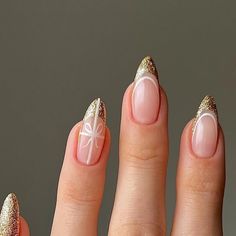 Alexandra Teleki on Instagram: "wrapped in gold ✨  ring @edgeofember & @victoria collection   _____ #goldnails #glitternails #sparklynails #frenchnails #holidaynails #winternails #christmasnails #nailartdesign #nailfashion #almondnails #nailinspo #christmasnailart" Simple Gold Christmas Nails, Holiday And New Years Nails, Festive Gold Nails, Christmas Nails Simple Acrylic, Christmas Gold Nails Art Designs, Simple Xmas Nails Short, Simple Christmas Nails Red And Gold, 26th Birthday Nail Ideas, Gold White Christmas Nails